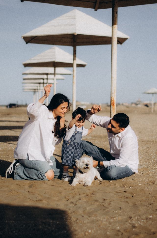 A family together on the beach