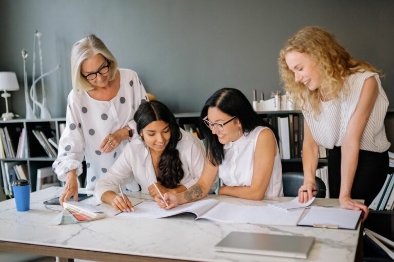 Women working together around a table